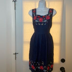 navy dress with flowers. Size medium Bust- 14” Length- 30”
